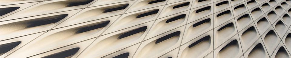 Cream slanted cladding against a blue sky Cream slanted cladding against a blue sky