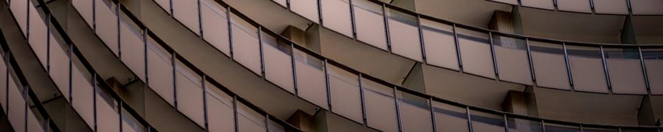 Curved gold brown building Curved gold brown building